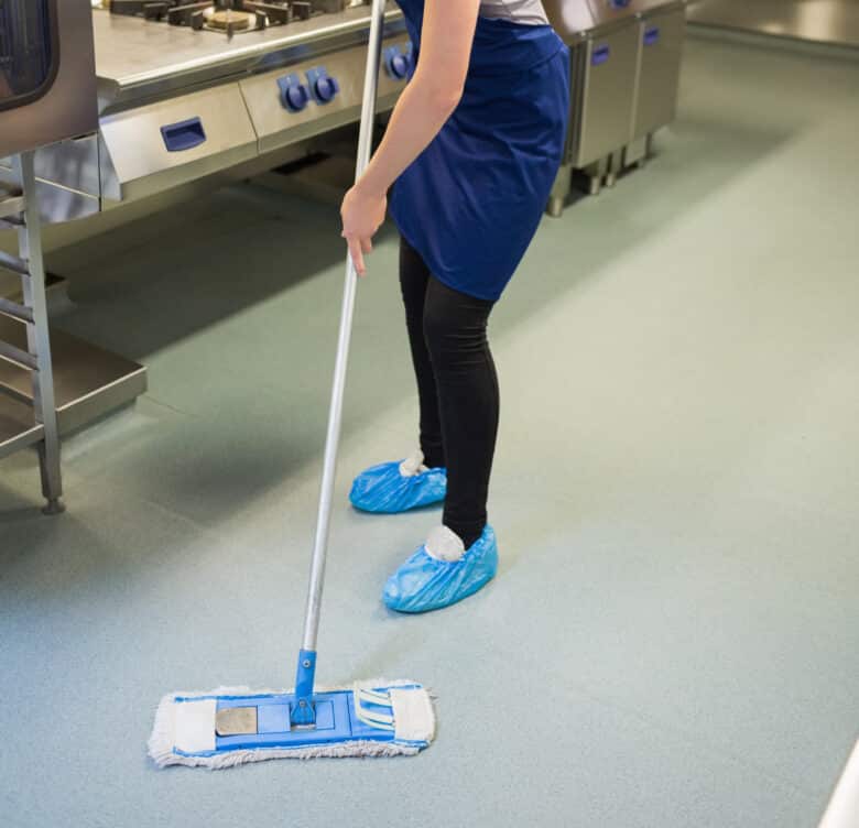 Woman cleaning the kitchen