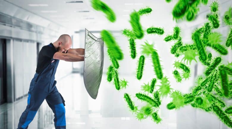 3D Rendering. woman protects with the shield by an attack of bacteria